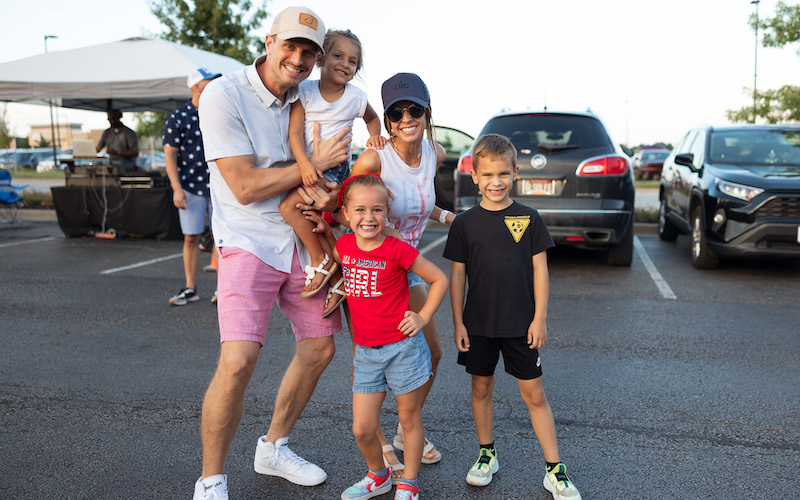 A mom, dad, and three children at Bluhawk